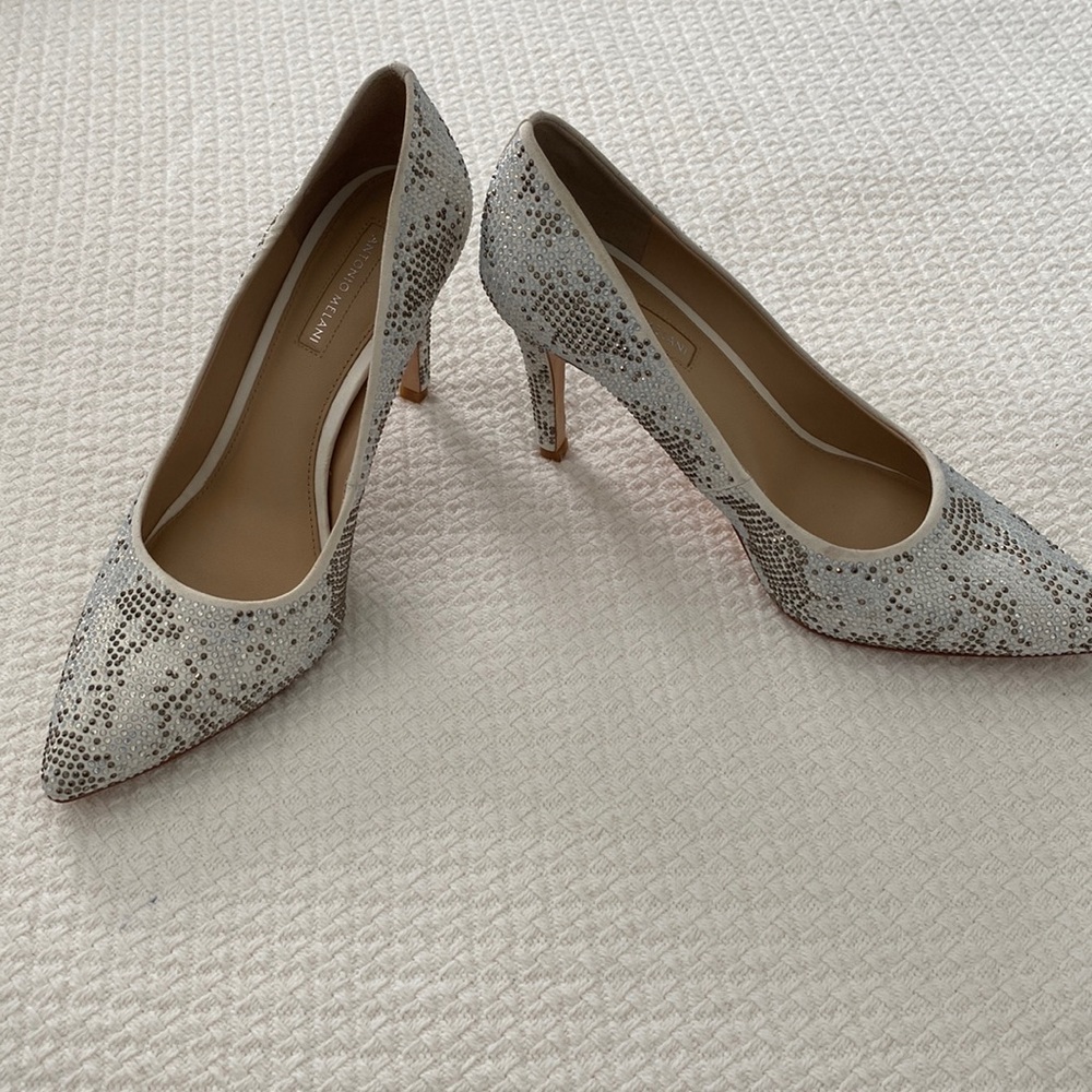 Beautiful rhinestone pumps. Barely worn. Excellent condition.